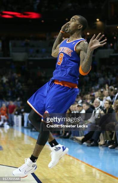 Smith of the New York Knicks reacts after shooting the game winning shot as time runs expires to defeat the Charlotte Bobcats 100-98 during their...
