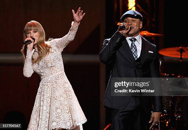 Singer Taylor Swift and rapper LL Cool J perform onstage at The GRAMMY Nominations Concert Live!! held at Bridgestone Arena on December 5, 2012 in...