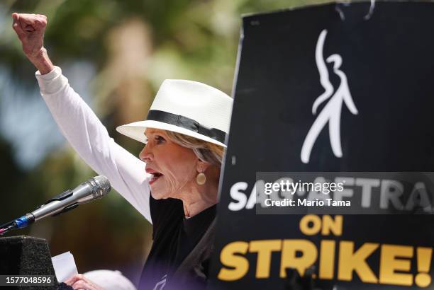 Jane Fonda speaks to the crowd as Starbucks workers stand on the picket line with striking SAG-AFTRA and Writers Guild of America members in...