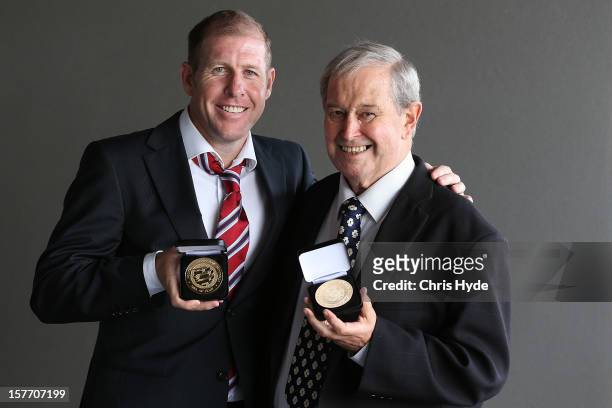 Scott Chipperfield and Alan Vessey pose with the Hall of Fame medal after being inducted into the 2012 Football Federation Australia Hall of Fame...