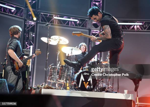 Musicians Mickey Madden, Matt Flynn and Adam Levine of Maroon 5 perform onstage at The GRAMMY Nominations Concert Live!! held at Bridgestone Arena on...