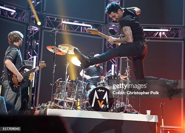 Musicians Mickey Madden, Matt Flynn and Adam Levine of Maroon 5 perform onstage at The GRAMMY Nominations Concert Live!! held at Bridgestone Arena on...