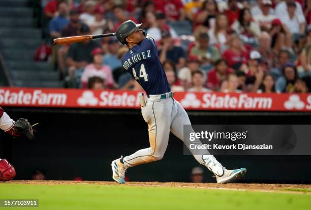 Julio Rodriguez of the Seattle Mariners hits a two-run home run against Reid Detmers of the Los Angeles Angels during the fourth inning at Angel...