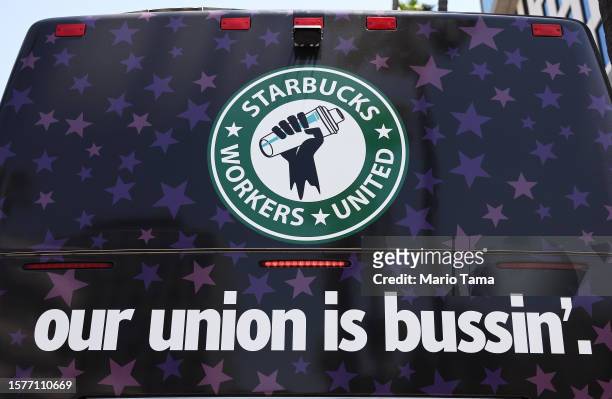 The Starbucks union bus is viewed after Starbucks workers stood on the picket line with striking SAG-AFTRA and Writers Guild of America members in...
