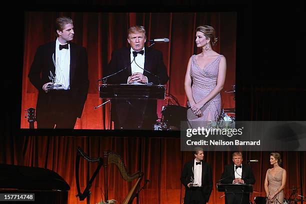 Eric Trump, Donald Trump and Ivanka Trump speak during the attends European School Of Economics Foundation Vision And Reality Awards on December 5,...