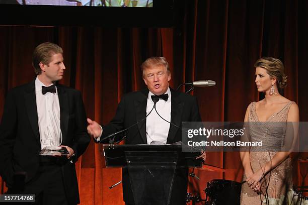 Eric Trump, Donald Trump and Ivanka Trump speak during the European School Of Economics Foundation Vision And Reality Awards on December 5, 2012 in...