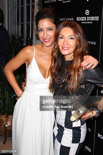Violet Camacho and Mojgan McClusky attend the Haute Living and Roger Dubuis dinner hosted By Daphne Guinness at Azur on December 5, 2012 in Miami...