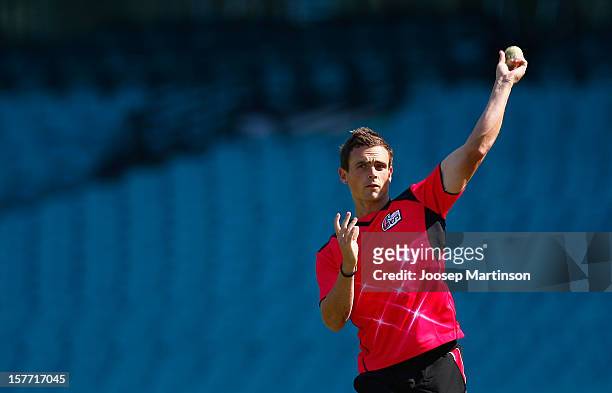 Stephen O'Keefe bowls during a Sydney Sixers training session at Sydney Cricket Ground on December 6, 2012 in Sydney, Australia.