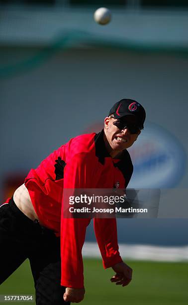 David Warner bowls during a Sydney Sixers training session at Sydney Cricket Ground on December 6, 2012 in Sydney, Australia.