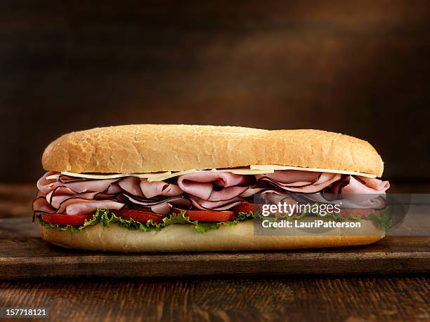 pé de presunto e queijo suíço sub - submarine sandwich imagens e fotografias de stock