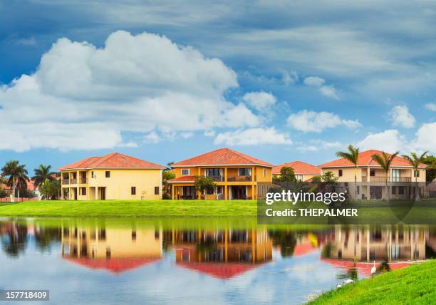 houses by the lake - miami house stock pictures, royalty-free photos & images