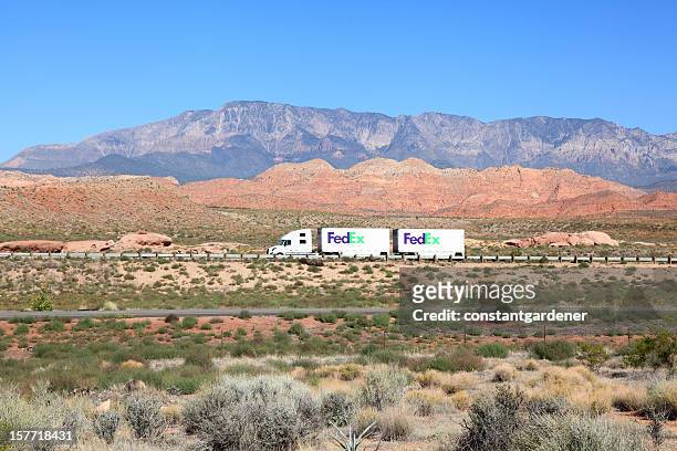 fedex ground traveling the beautiful american landscape - fed ex stock pictures, royalty-free photos & images