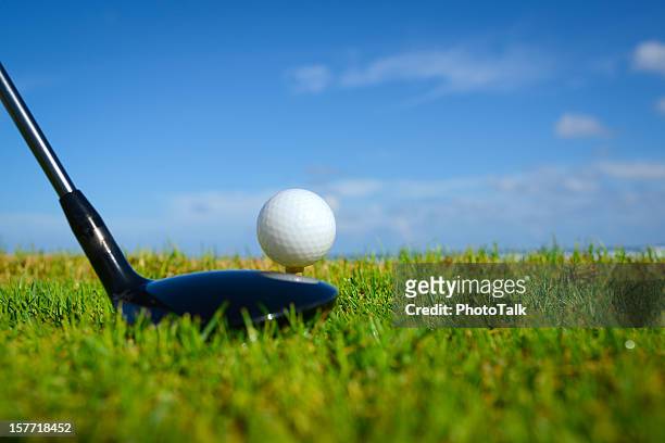 golf ball on tee - golf driver stock pictures, royalty-free photos & images