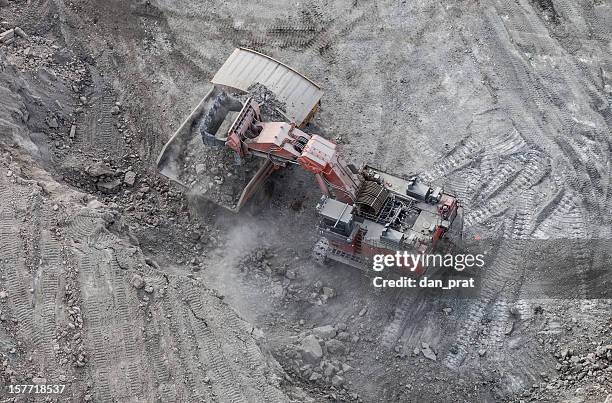 hydrolic mining excavator, aerial photo - fort mcmurray stock pictures, royalty-free photos & images