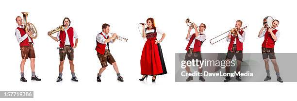 seven costumed members of a bavarian/austrian brass band - brass band stock pictures, royalty-free photos & images