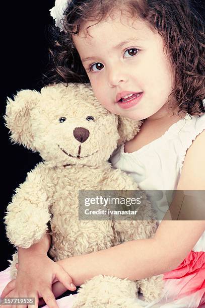 cute dark hair brown eye little girl with teddy bear - 3 years brunette female alone caucasian stock pictures, royalty-free photos & images