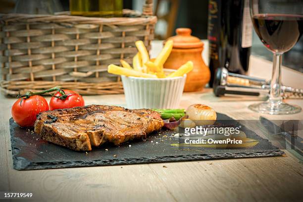 rustic rump steak and french fries on slate plate - gastro pub stock pictures, royalty-free photos & images