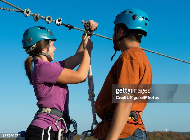 riding canopy tour - hochseilgarten stock-fotos und bilder