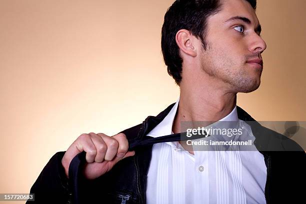 man with loose tie - taking off coat stock pictures, royalty-free photos & images