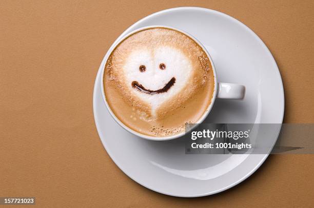cappuccino - mug face stock pictures, royalty-free photos & images