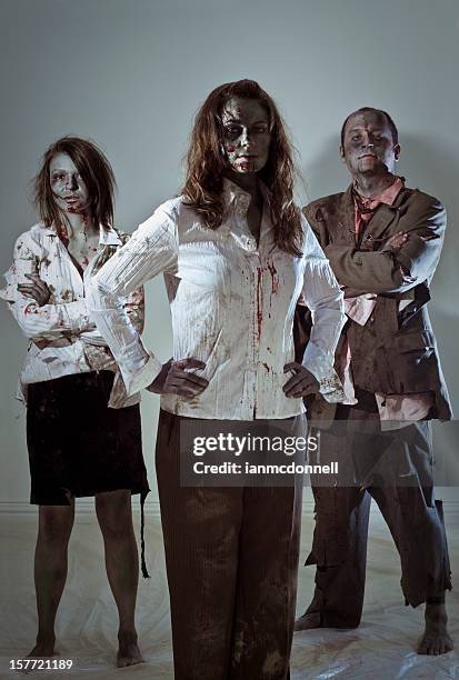 zombie equipo de negocios - zombie makeup fotografías e imágenes de stock