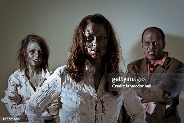 zombie business team - halloween zombie makeup stock pictures, royalty-free photos & images