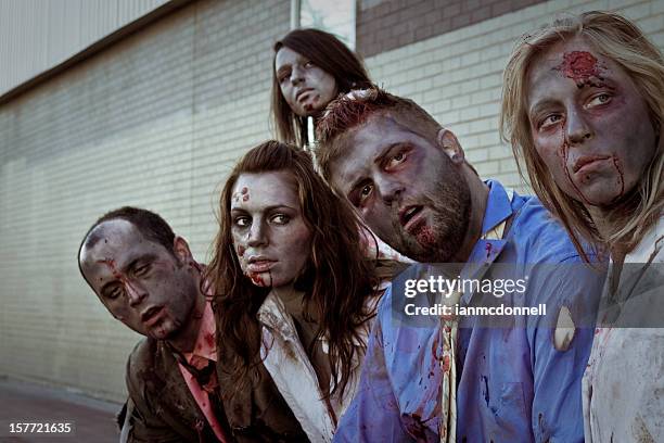 5 zombies staring at something off camera - zombie stock pictures, royalty-free photos & images