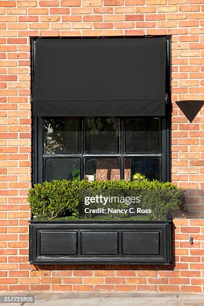 stylish window box and awning, street scene, urban living - window box stock pictures, royalty-free photos & images