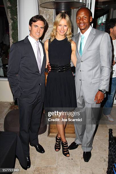 Archie Drury, model Karolina Kurkova and Ray Allen attend the Haute Living and Roger Dubuis dinner hosted by Daphne Guinness at Azur on December 5,...