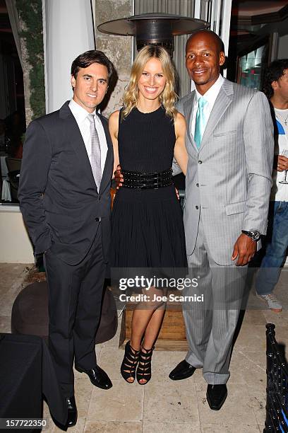 Archie Drury, model Karolina Kurkova and Ray Allen attend the Haute Living and Roger Dubuis dinner hosted by Daphne Guinness at Azur on December 5,...