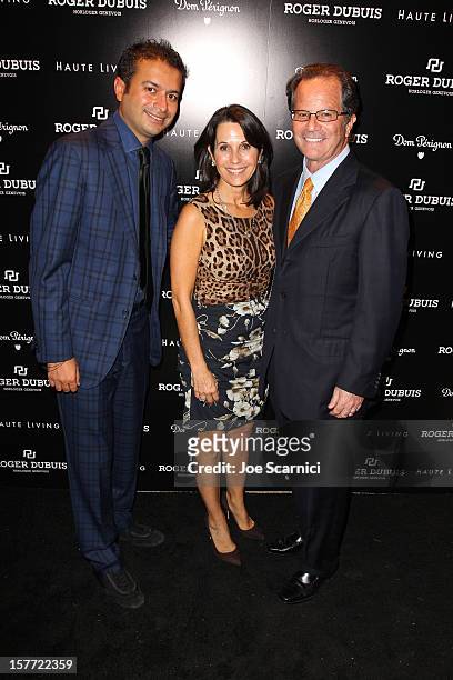 Robin Levinson and Mark Levinson attend the Haute Living and Roger Dubuis dinner hosted By Daphne Guinness at Azur on December 5, 2012 in Miami...