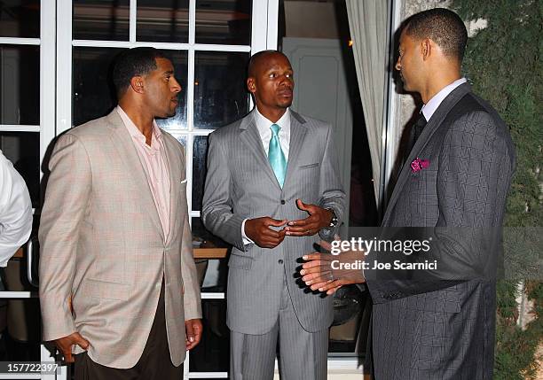 Ray Allen and Juwan Howard attend the Haute Living and Roger Dubuis dinner hosted By Daphne Guinness at Azur on December 5, 2012 in Miami Beach,...