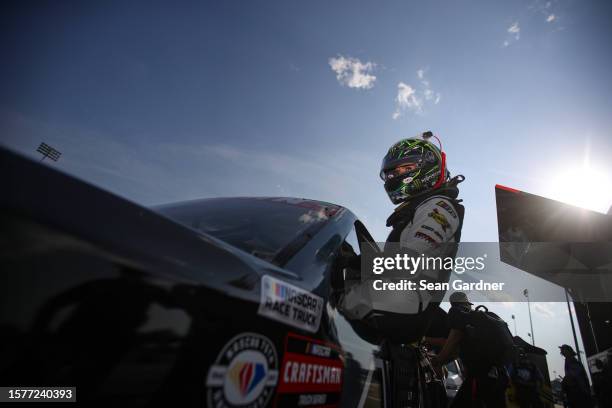 Hailie Deegan, driver of the Ford Performance Ford, enters her truck during qualifying for the NASCAR Craftsman Truck Series Worldwide Express 250 at...