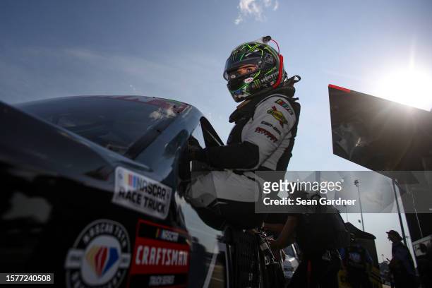 Hailie Deegan, driver of the Ford Performance Ford, enters her truck during qualifying for the NASCAR Craftsman Truck Series Worldwide Express 250 at...