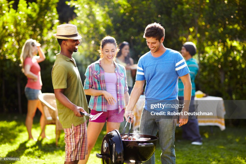 Friends having a BBQ.