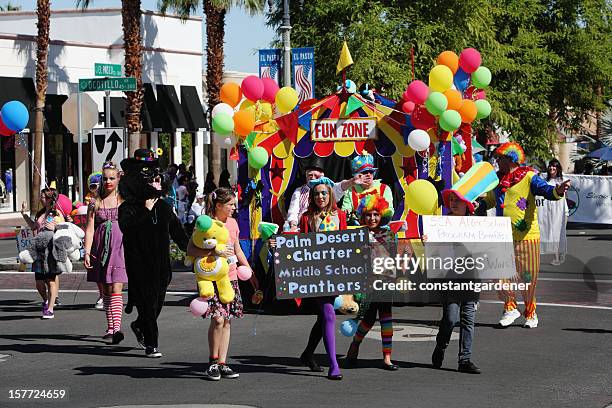 golf cart parade and charter school kids - palm desert california stock pictures, royalty-free photos & images