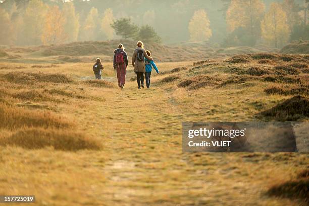 people walking in nature - heather stock pictures, royalty-free photos & images