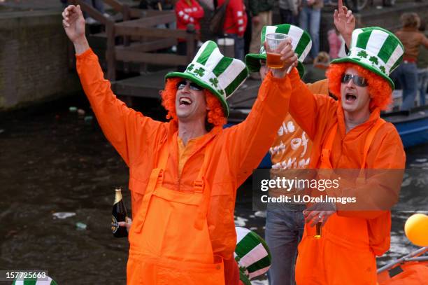 koninginnedag-queen's day em amsterdã - koningsdag - fotografias e filmes do acervo