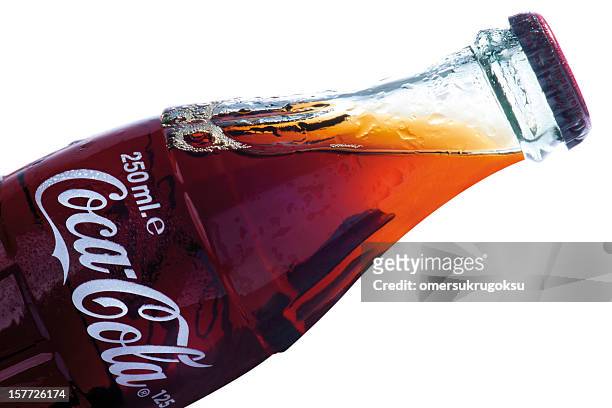 classical coca-cola bottle - cola bottle stock pictures, royalty-free photos & images