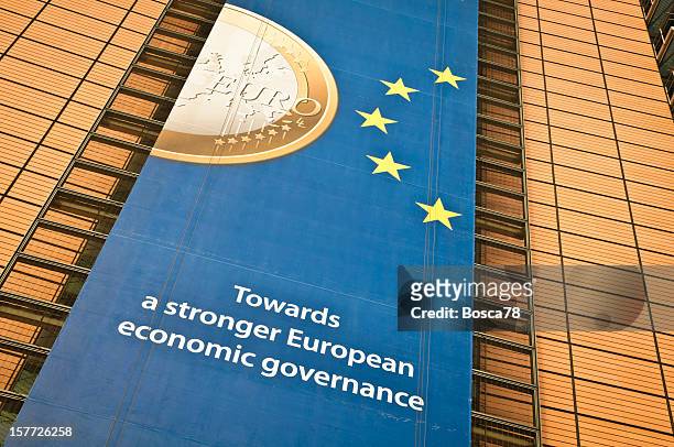 ads on the facade of berlaymont building, brussels - eec headquarters stock pictures, royalty-free photos & images
