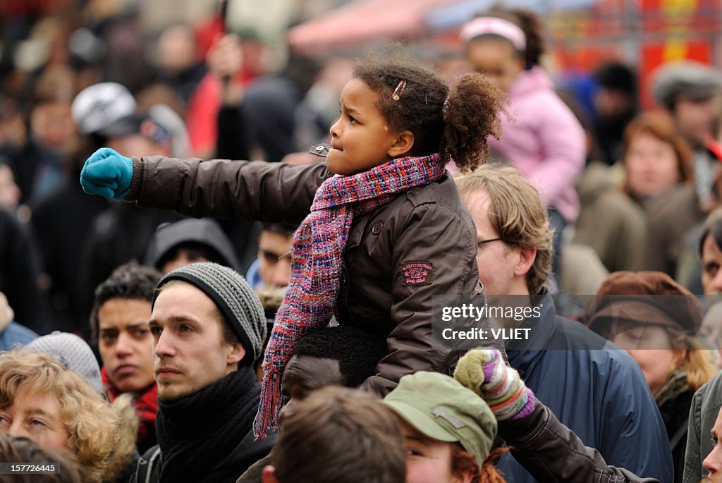 Multi-ethnic crowd participating in an anti-racism protest