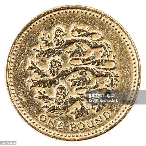 one pound coin with english lions - pound coins stock pictures, royalty-free photos & images