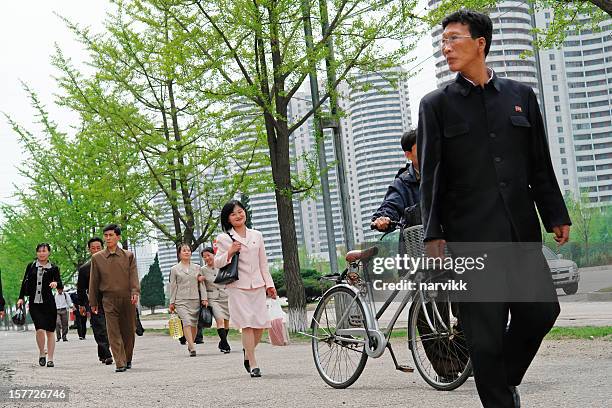 daily life in the centre of pyongyang - north korea people stock pictures, royalty-free photos & images