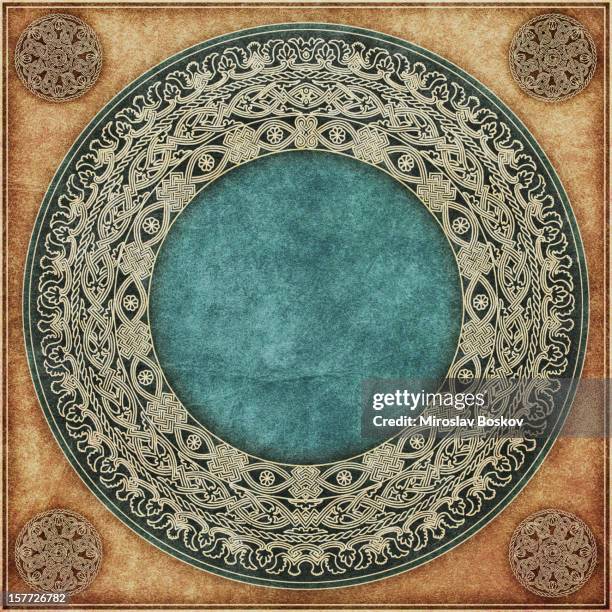 hi-res medieval decorative gilded arabesque rosette on animal-skin parchment - mottled skin 個照片及圖片檔