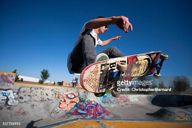 skateboarder at a skate park - skating stock pictures, royalty-free photos & images