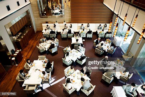 busy japanese restaurant - eating in crowded restaurant stock pictures, royalty-free photos & images