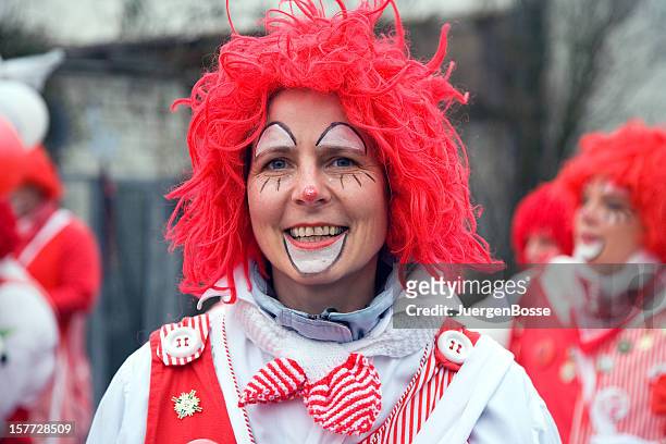 street carnival in cologne with female clown - fasching stock pictures, royalty-free photos & images