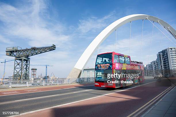 tourist bus crossing the squinty bridge, glasgow - theasis stock pictures, royalty-free photos & images