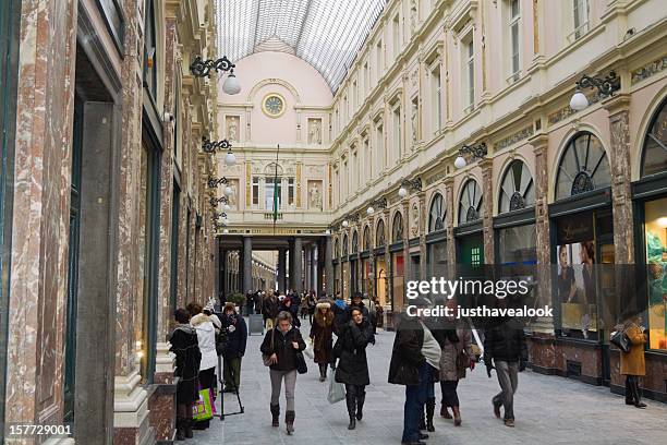 royal galleries saint-hubert in brussels - adult man brussels stock pictures, royalty-free photos & images