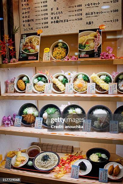 window display with plastic food, tokyo, japan - fake food stock pictures, royalty-free photos & images